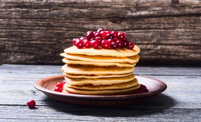 stack of pancakes with cranberries