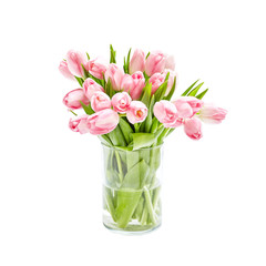 Pink tulips bouquet in glass vase. Isolated over white background 