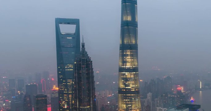 Time-lapse of Shanghai's three tallest skyscrapers, the Shanghai World Financial Center, the Jin Mao Tower, and the Shanghai Tower at sunset