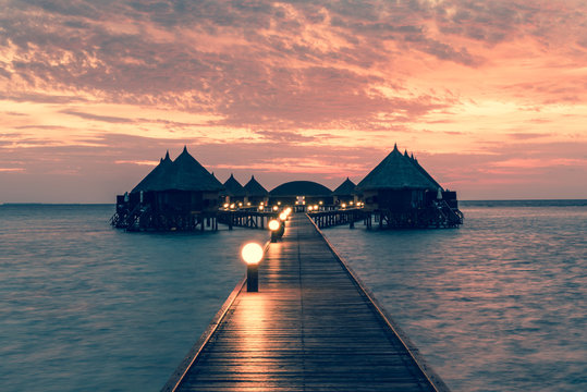 Fantastic sunset on a tropical island in the Maldives. Luxury Resort Angaga.  Ari Atoll.