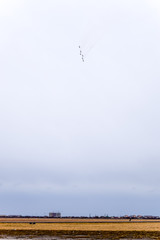 Air show in the sky above the Krasnodar airport flight school. Airshow in honor of Defender of the...
