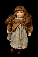 Toy Doll on Black Background