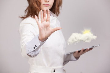 Woman with cloud and sun. Concept on the topic of computer cloud services.