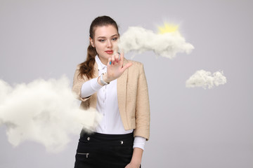 Woman with cloud and sun. Concept on the topic of computer cloud services.