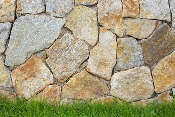 stonework background with green grass