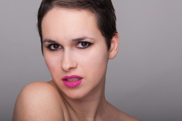 Bright closeup portrait of beautiful woman