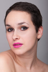 Beautiful face of young woman with clean skin