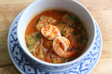 Spicy sour soup with deep fried acacia omelette