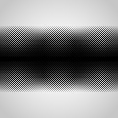 Halftone abstract black dots design element isolated on a white background.