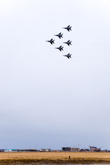 Air show in the sky above the Krasnodar airport flight school. Airshow in honor of Defender of the...