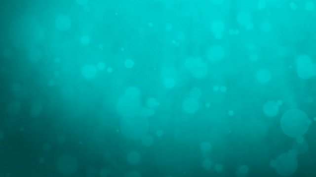 Abstract turquoise blue background with floating particles. Seamlessly loopable animation.
