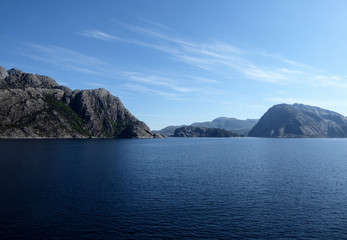 Stunning view of fjords and mountainous landscape on sunny day