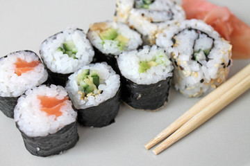 Set of sushi roll. Different types of sushes with chopstiks.