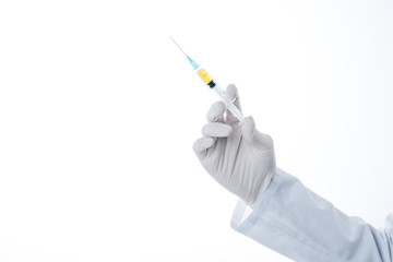 Partial view of doctor holding syringe on white, medicine and healthcare concept