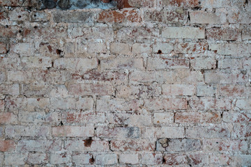white brick wall texture of abandoned and burnt building