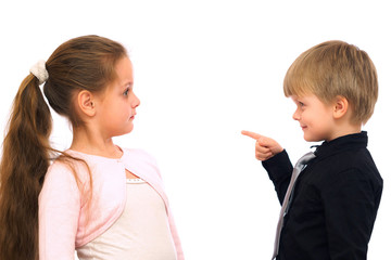 Funny little boy teaches the girl