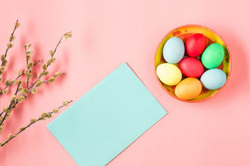 Obraz premium The top view of easter on pink table office workplace