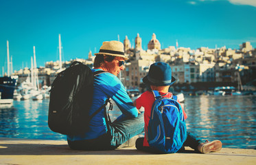 father and son looking at city of Valetta, Malta