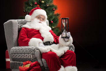 Santa Claus showing sandwatch