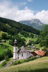 Fototapeta na wymiar Beautiful pilgrimage church of Maria Gern with the mountain Watzmann in Bavarian Alps