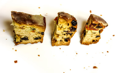 few pices of Christmas Stollen on a white plate