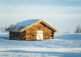 A beautiful old wooden house in the winter scenery