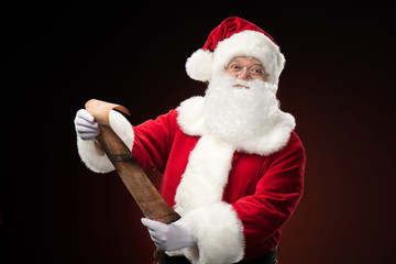 Santa Claus standing with wishlist