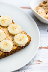 Toasts from Wholewheat Bread with Peanut Butter and Banana