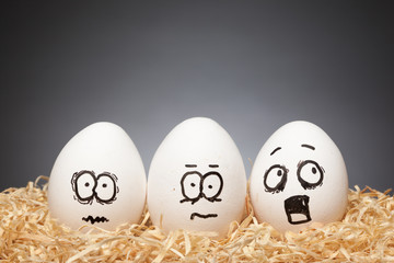 Fototapeta premium Funny little Easter Egg Stories, hand drawn faces with expression: Scared