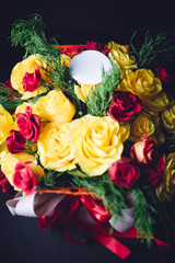 Beautiful red and yellow roses put in a bouquet