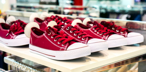 lots of colorful sneaker shoes on sale