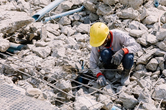 Construction Worker Keep Concrete Debris Leaving In Construction Area