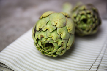 artichokes on wooden board