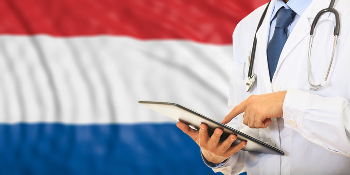 Doctor on Netherlands flag background. 3d illustration