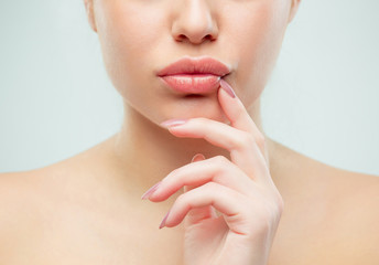 Obraz na płótnie Canvas The close up shot of woman lips