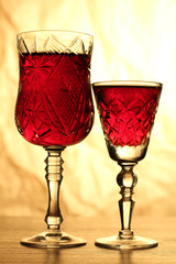 Glass and bottle wine on wooden table