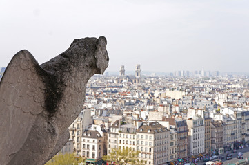 Gargoyle looks out over Paris