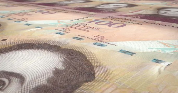 Banknotes of one hundred Venezuelan bolivars rolling on screen, cash money, loop