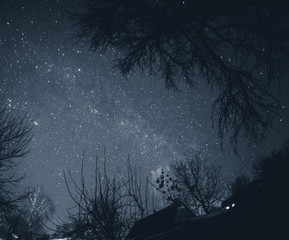 Starry sky above the village