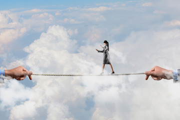 She is walking blindfolded . Mixed media