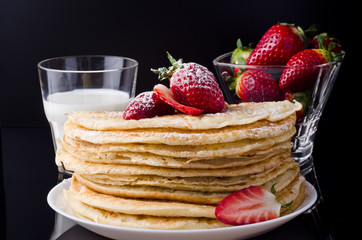 Home made pancakes on the luxury black background