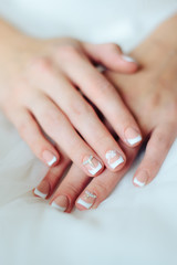 Fototapeta premium bride's hands with manicure