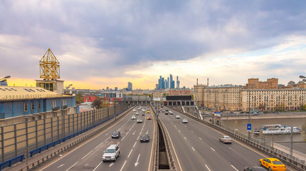 Fototapeta na wymiar View of Third Transport Ring, busy highway in Moscow at sunset, urban landscape