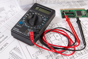 electrical engineering drawings, electronic board and digital multimeter
