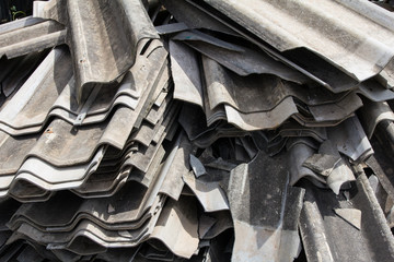 Pile of construction metals in factory. Steel tubes, iron pipes and bars.