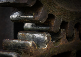 The old and rusty gear in sunlight
