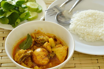 spicy chicken with egg spoiled while being incubated curry and rice