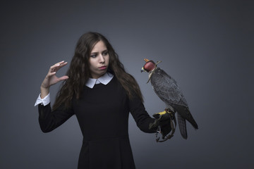 Girl and peregrine studio shooting