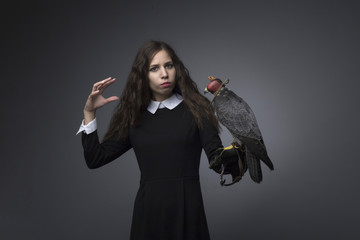 Girl and peregrine studio shooting