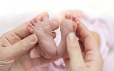 Obraz na płótnie Canvas little foot of newborn